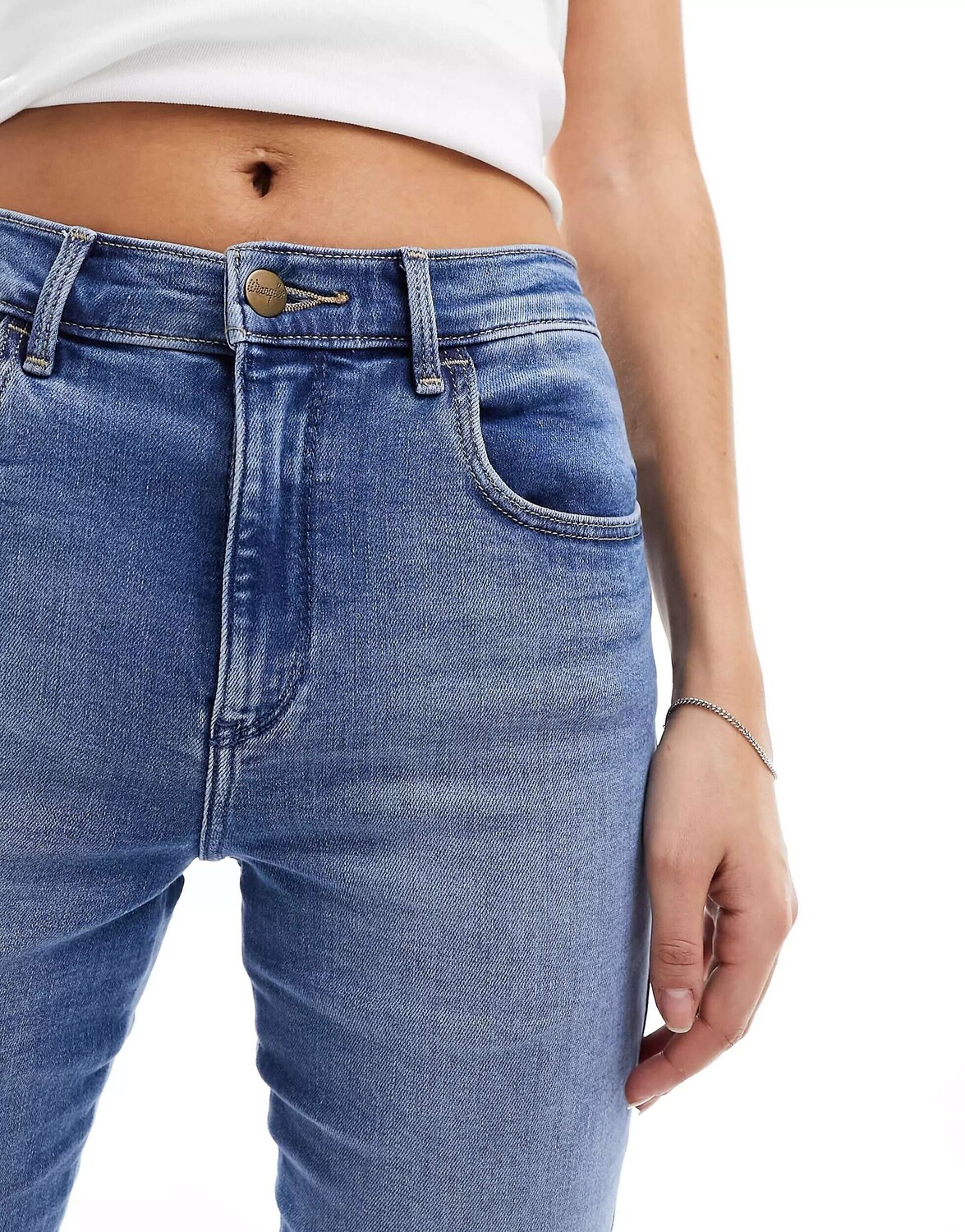 

Светло-голубые узкие джинсы Wrangler