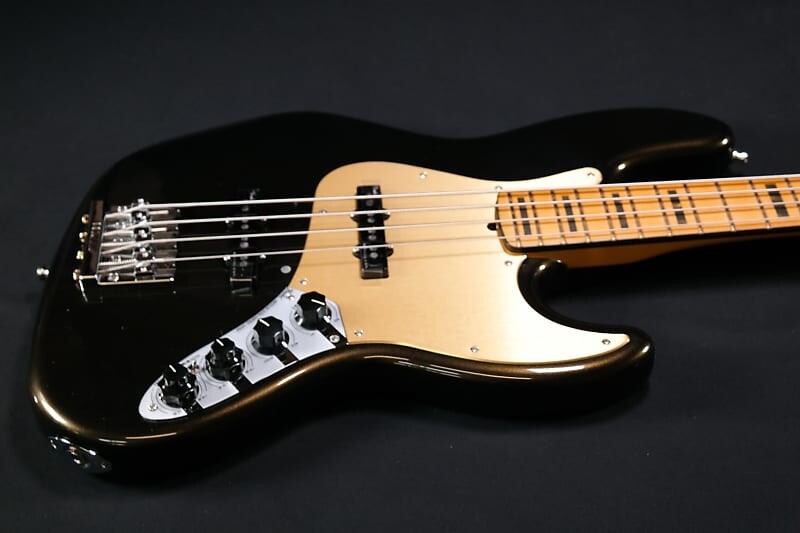 

Басс гитара Fender American Ultra Jazz Bass - Maple Fingerboard - Texas Tea 845