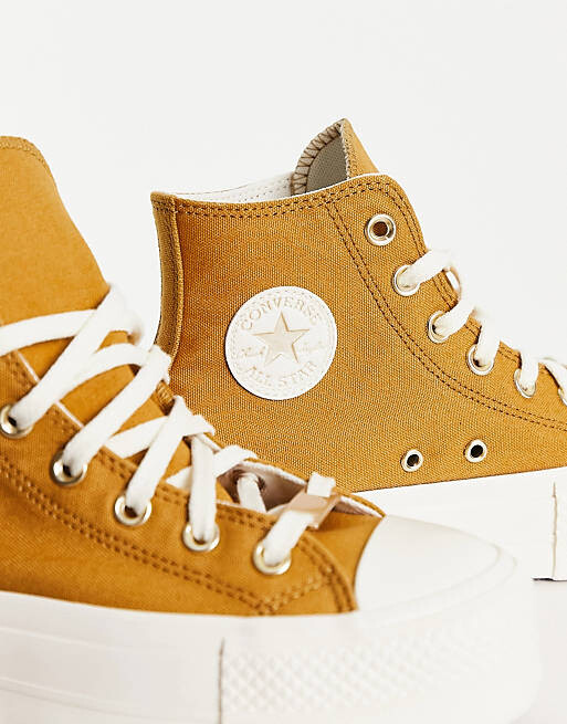 

Золотые кроссовки на платформе Converse Chuck Taylor All Star Lift Hi, Желтый
