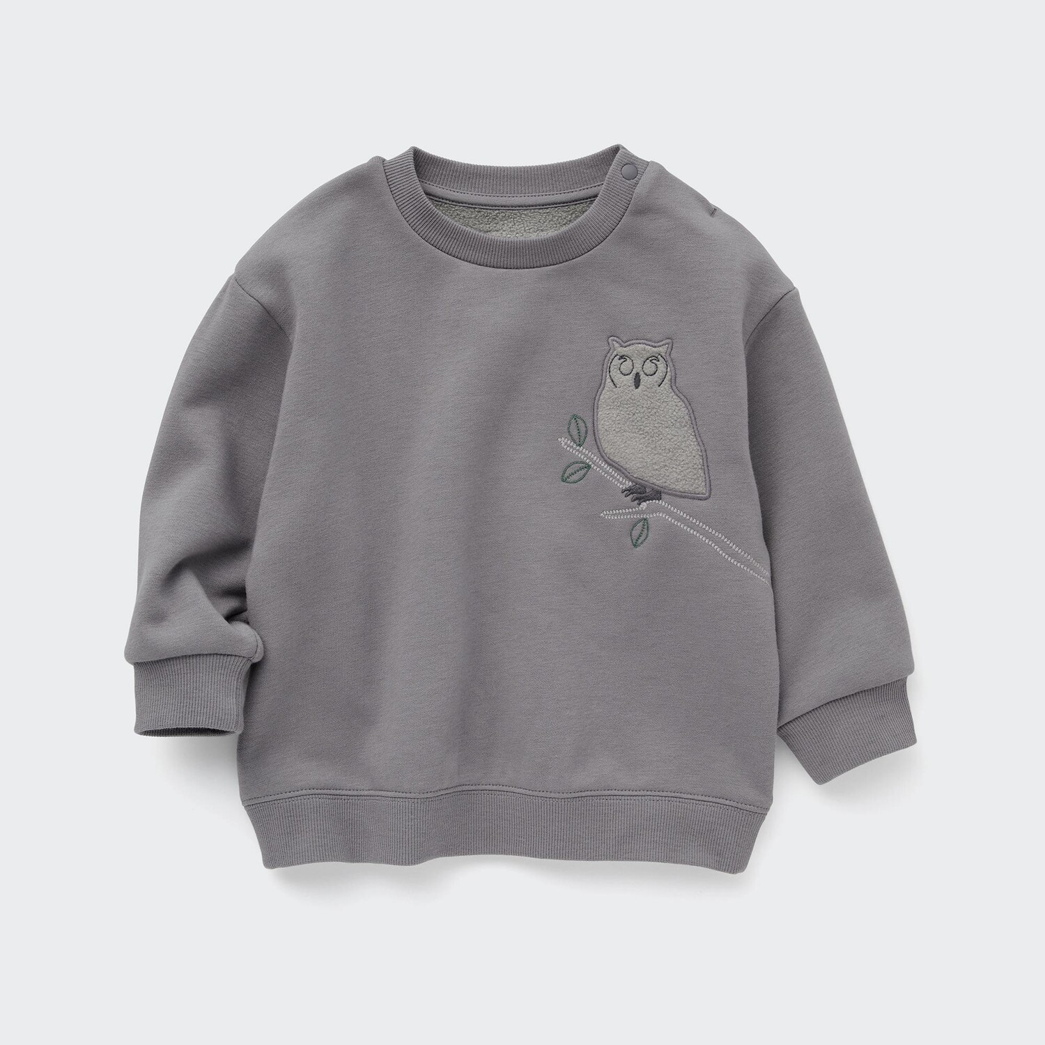 

Свитшот UNIQLO флисовый с животным принтом, серый