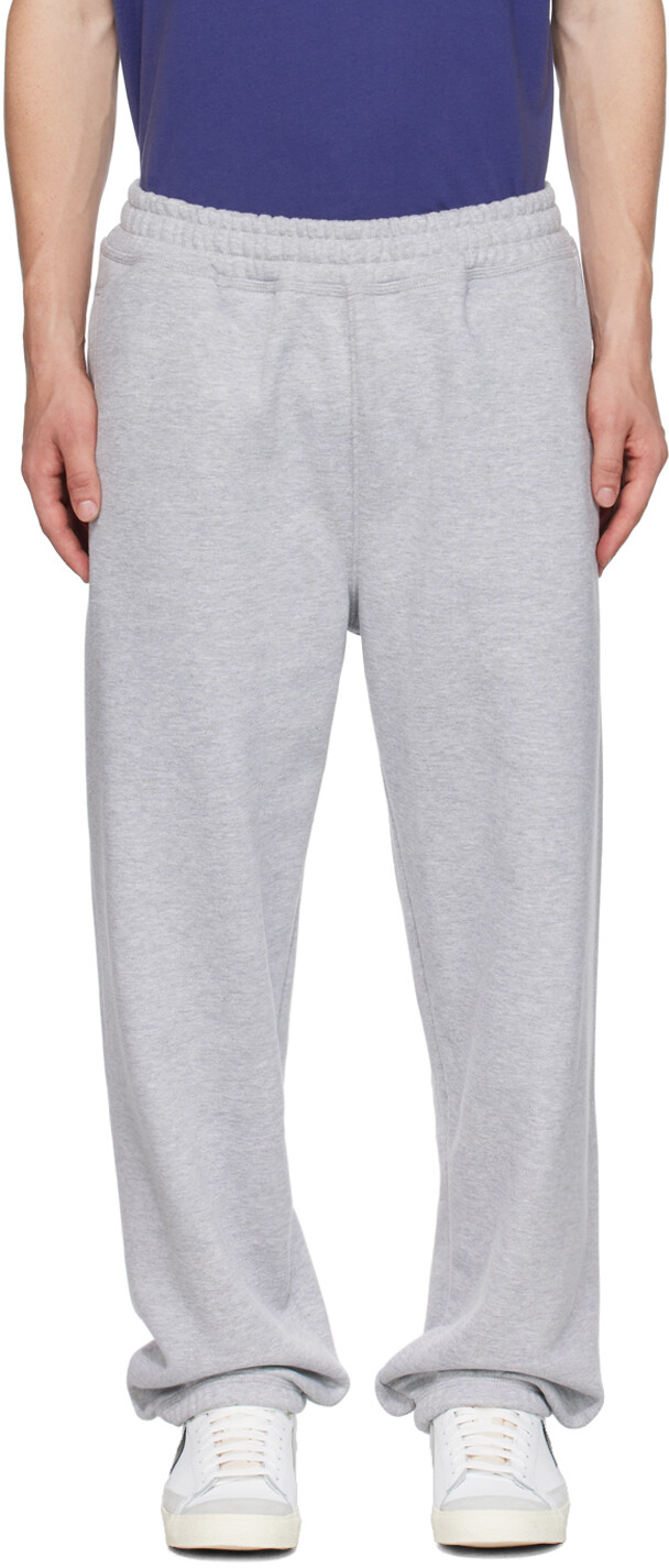 

Серые спортивные штаны с вышивкой Stussy