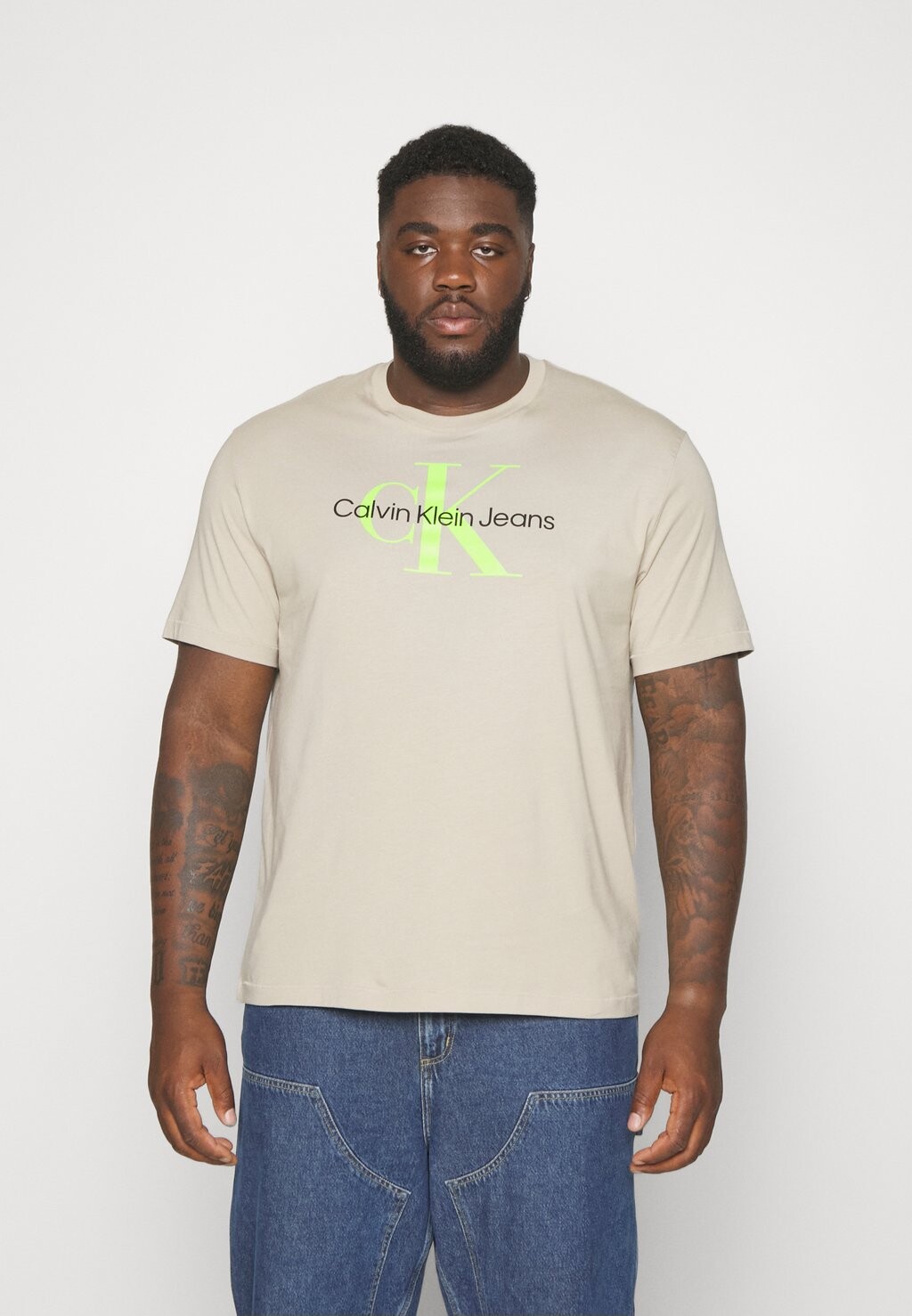 

Футболка с принтом Calvin Klein, бежевый