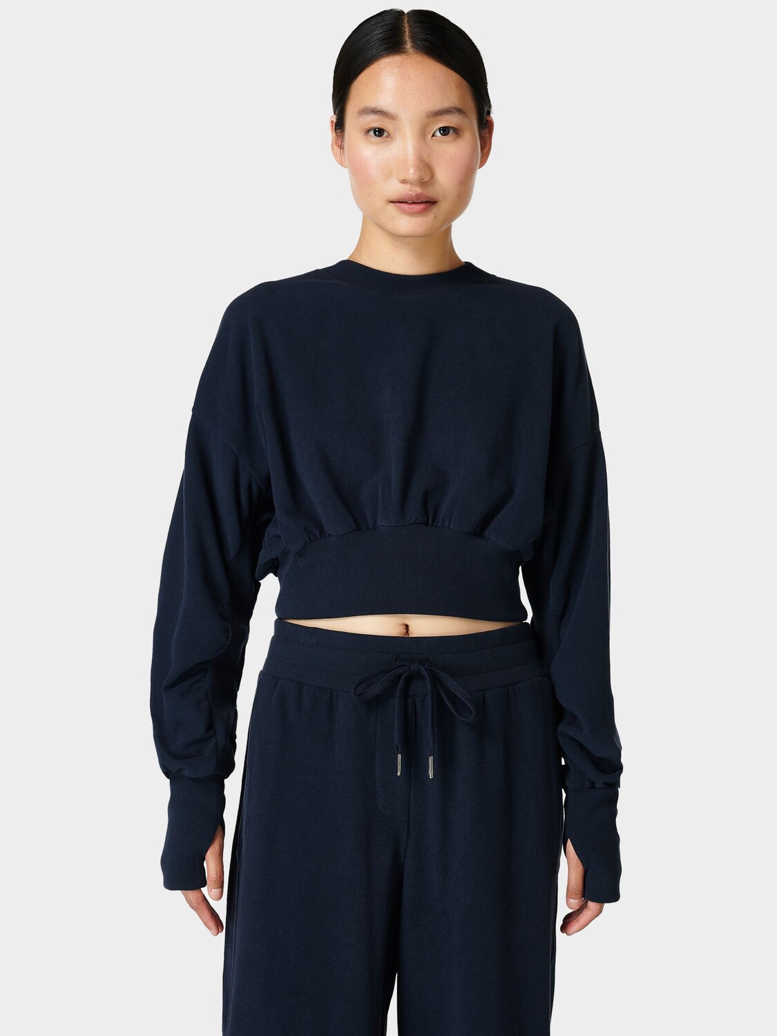 

Укороченный флисовый топ Sweaty Betty Delight Luxe, темно-синий