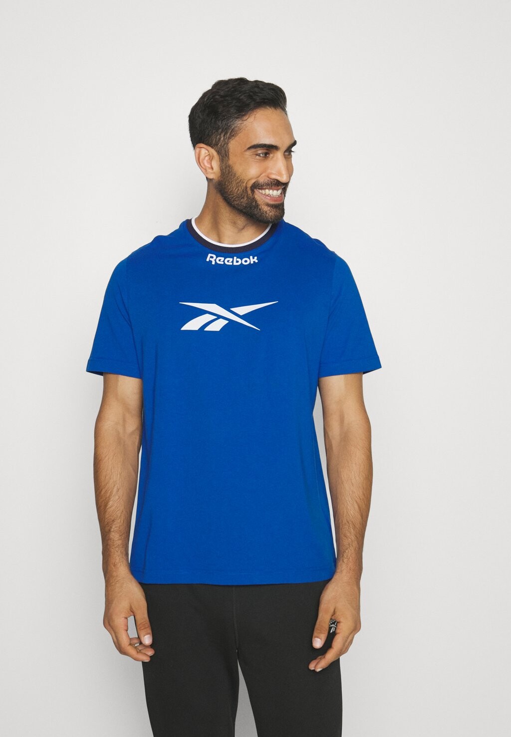 

Рубашка с принтом Reebok