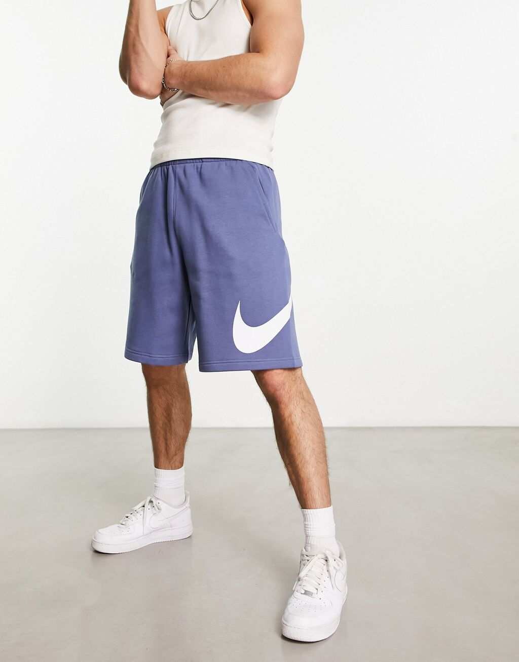 

Синие шорты с галочкой Nike Club