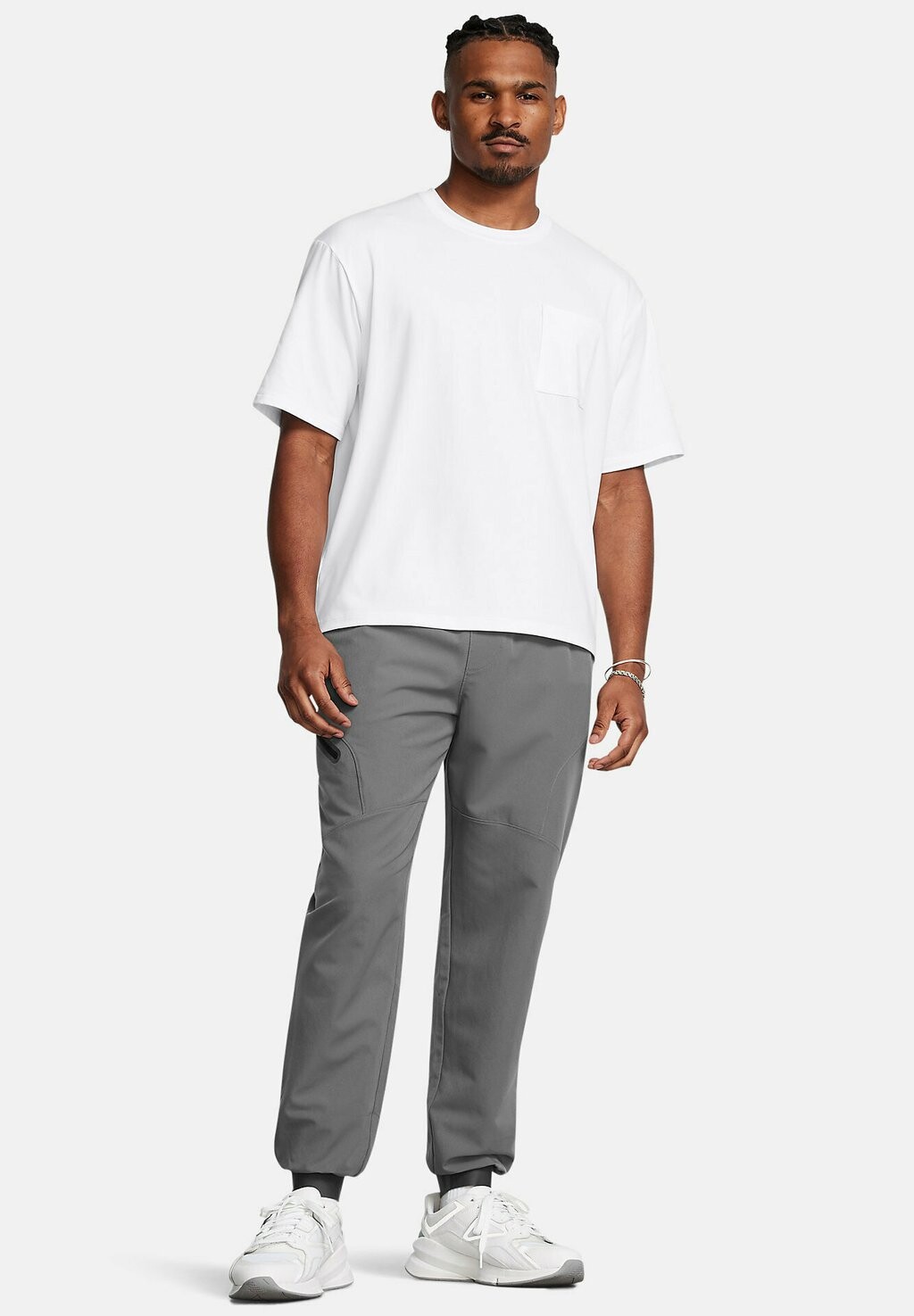

Спортивные штаны UNSTOPPABLE JOGGERS Under Armour, серый