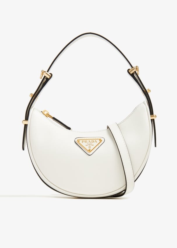 

Сумка через плечо Prada Arqué Leather Mini, белый