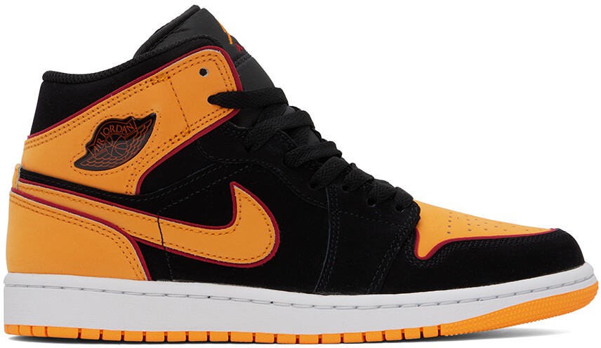 

Черные и оранжевые кроссовки Nike Jordan Air Jordan 1 Mid SE