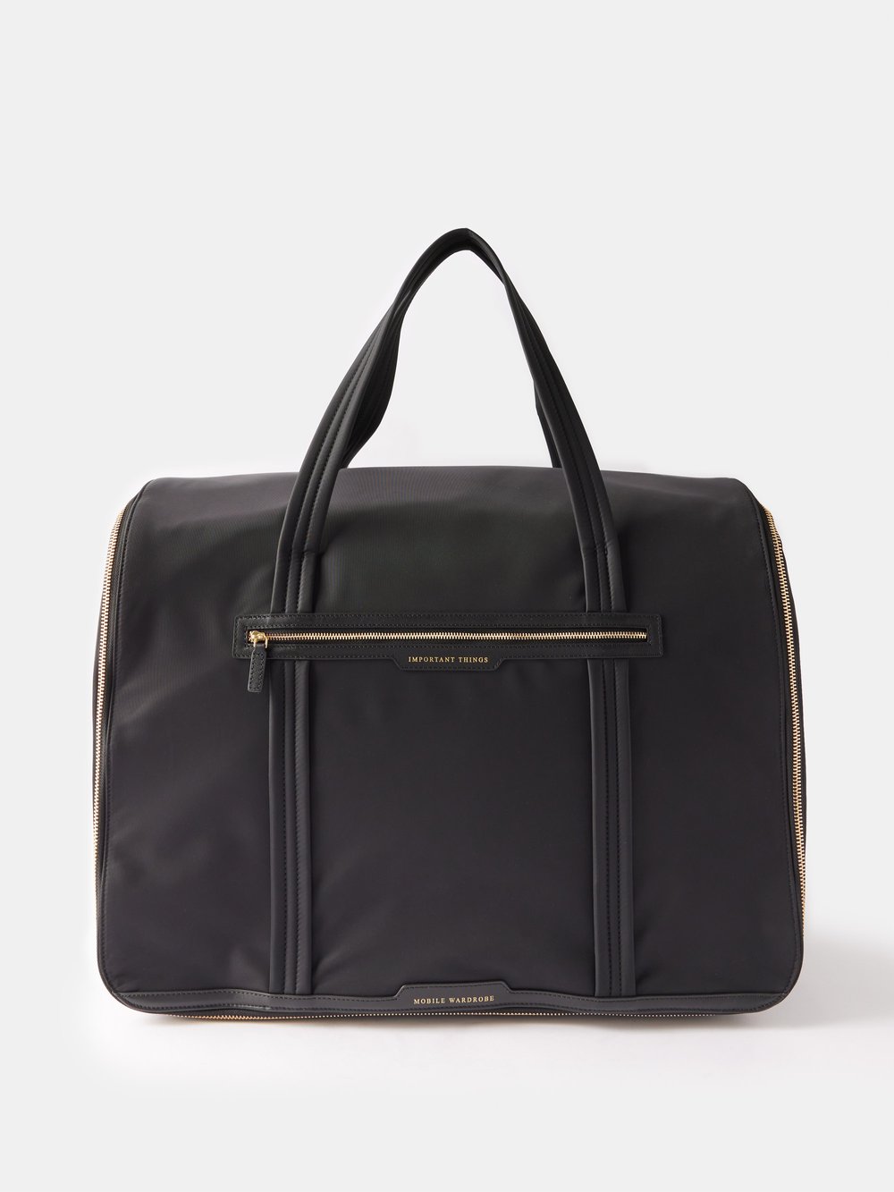 Дорожная сумка mobile wardrobe из переработанного нейлона Anya Hindmarch, черный сумка для мытья посуды lotions and potions из ракушки и кожи anya hindmarch желтый