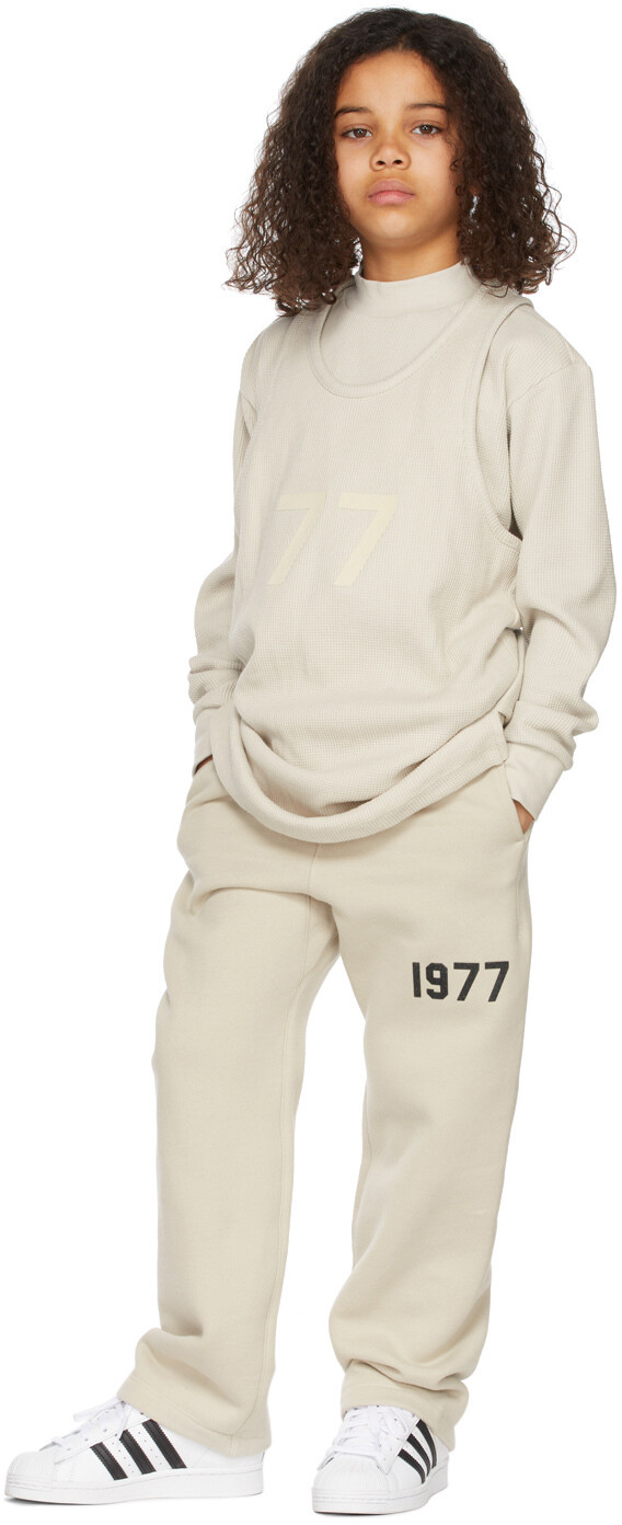 

Детская бежевая майка Waffle 77 Fear of God ESSENTIALS