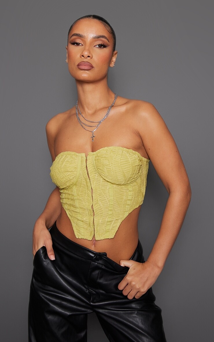 

PrettyLittleThing Оливковый текстурированный корсет с глубоким вырезом спереди