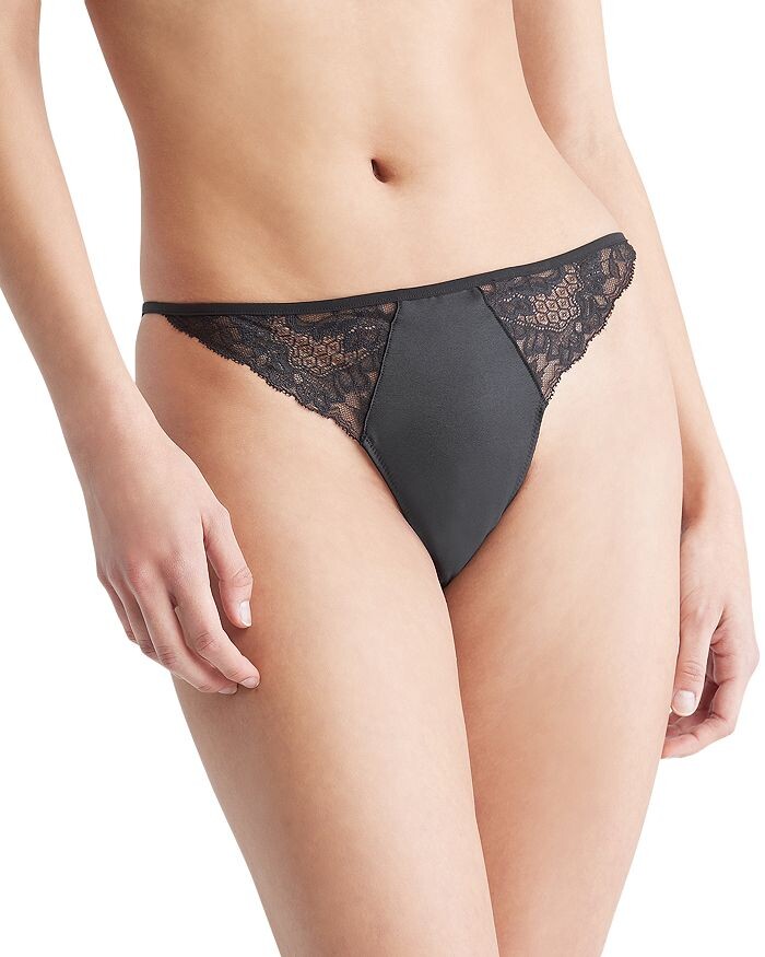 

Кружевные и атласные стринги Calvin Klein