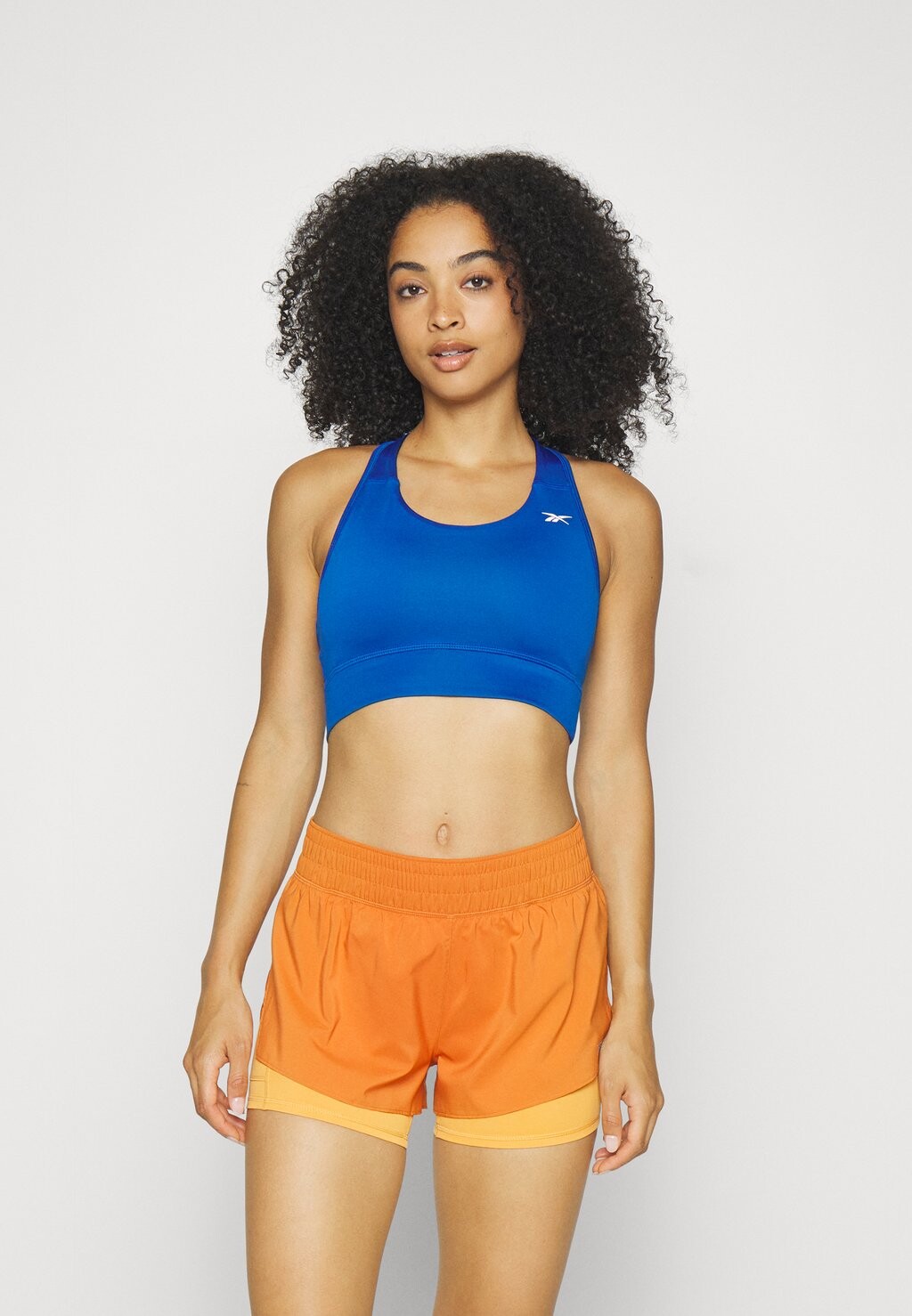 

Спортивный бюстгальтер с высокой поддержкой. BRA Reebok, синий