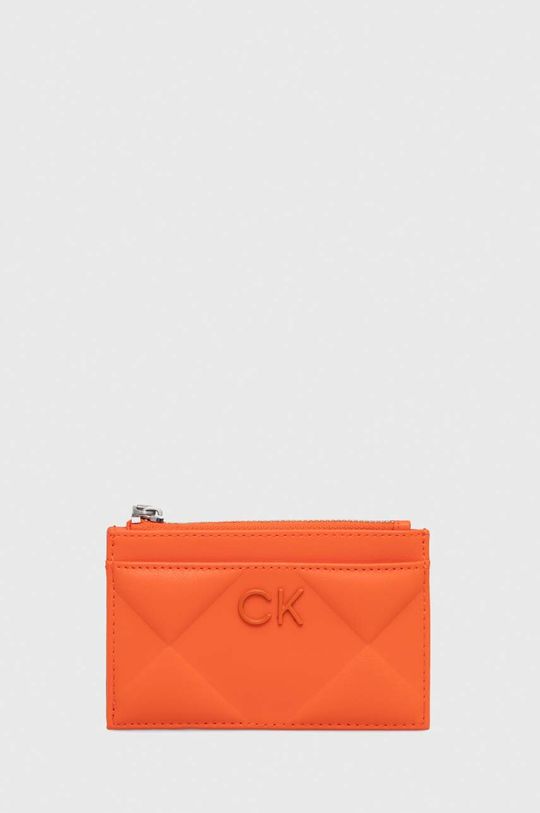 цена Кошелек Calvin Klein, оранжевый