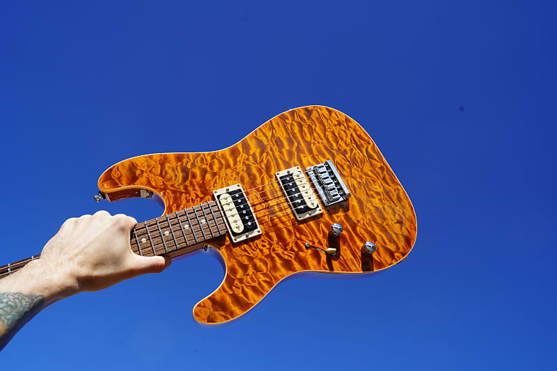 

Электрогитара Schecter Left Handed USA Custom Shop Masterworks Exotic Top Vintage Trans Amber NOS