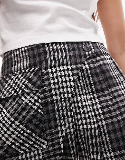

Мини-юбка в однотонную клетку со складками Topshop