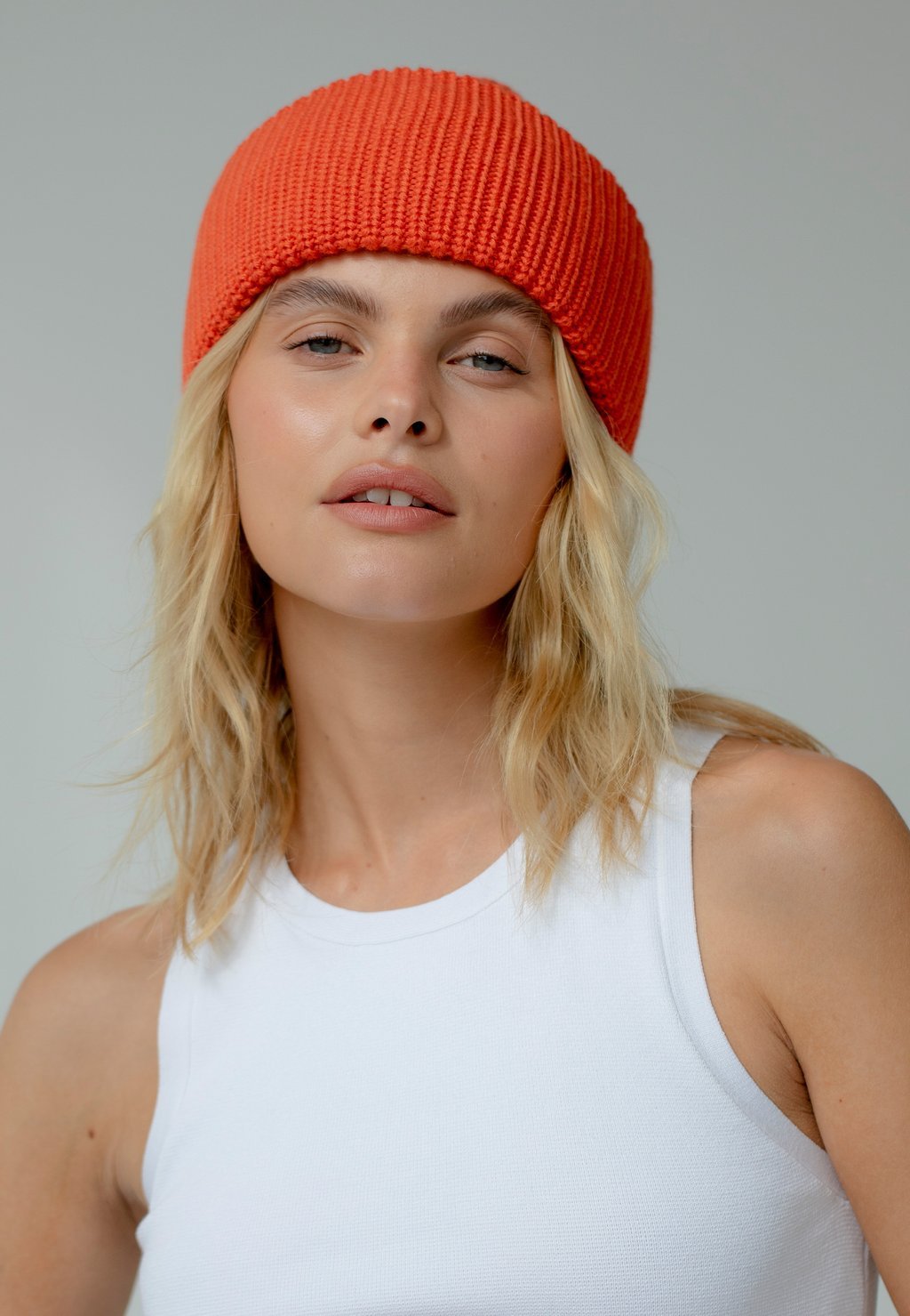 

Шапка THE MERINO ARCTIC FOX & CO., цвет coral