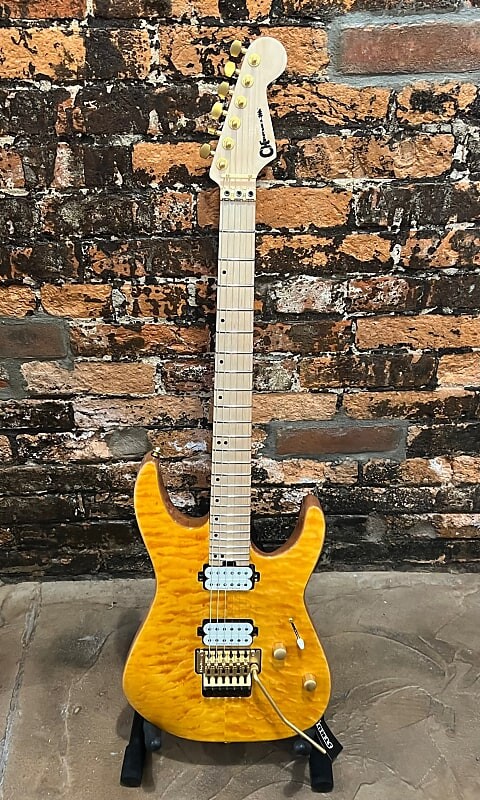 цена Электрогитара Charvel Pro-Mod DK24 HH FR M Mahogany with Quilt Maple Top 2020 - Present - Dark Amber