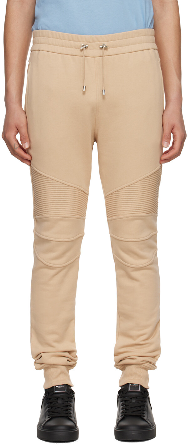 

Бежевые спортивные штаны с флоком Balmain