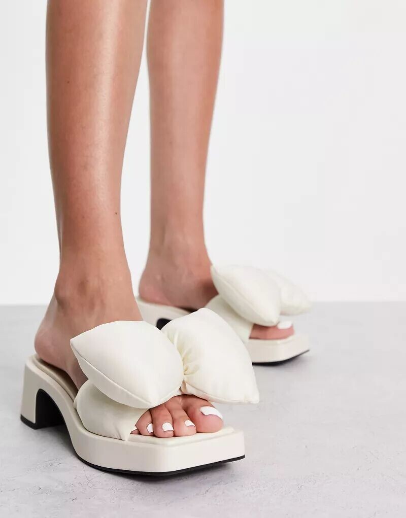 

Кремовые туфли-мюли Charles & Keith с пышным бантом и каблуком средней длины