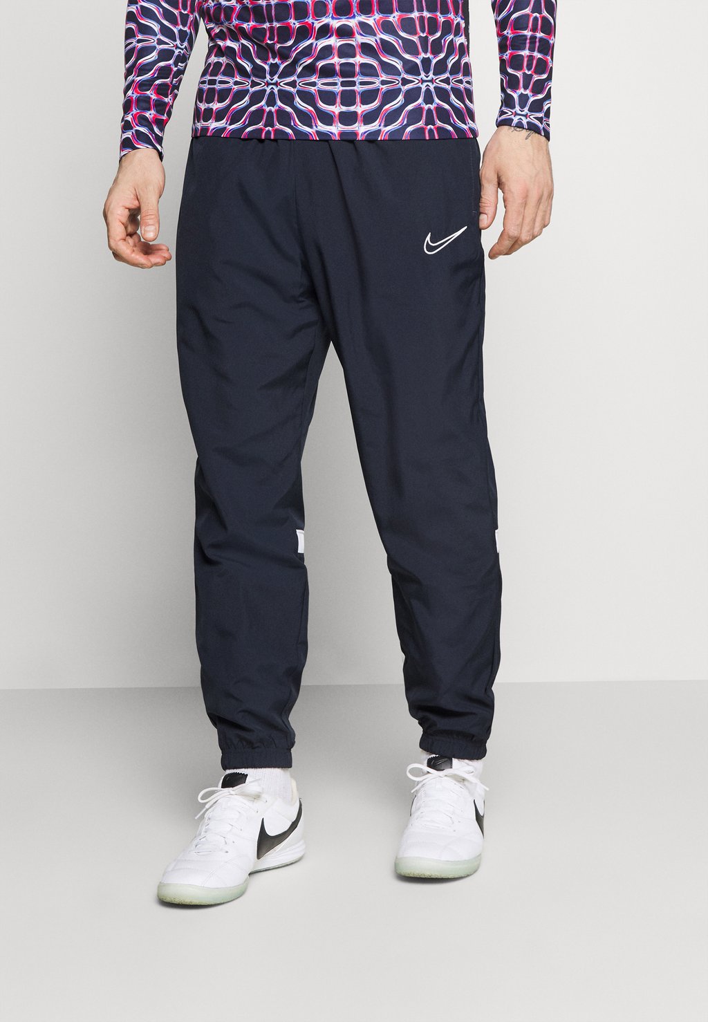 

Спортивные брюки Academy Pant Nike, цвет obsidian/white