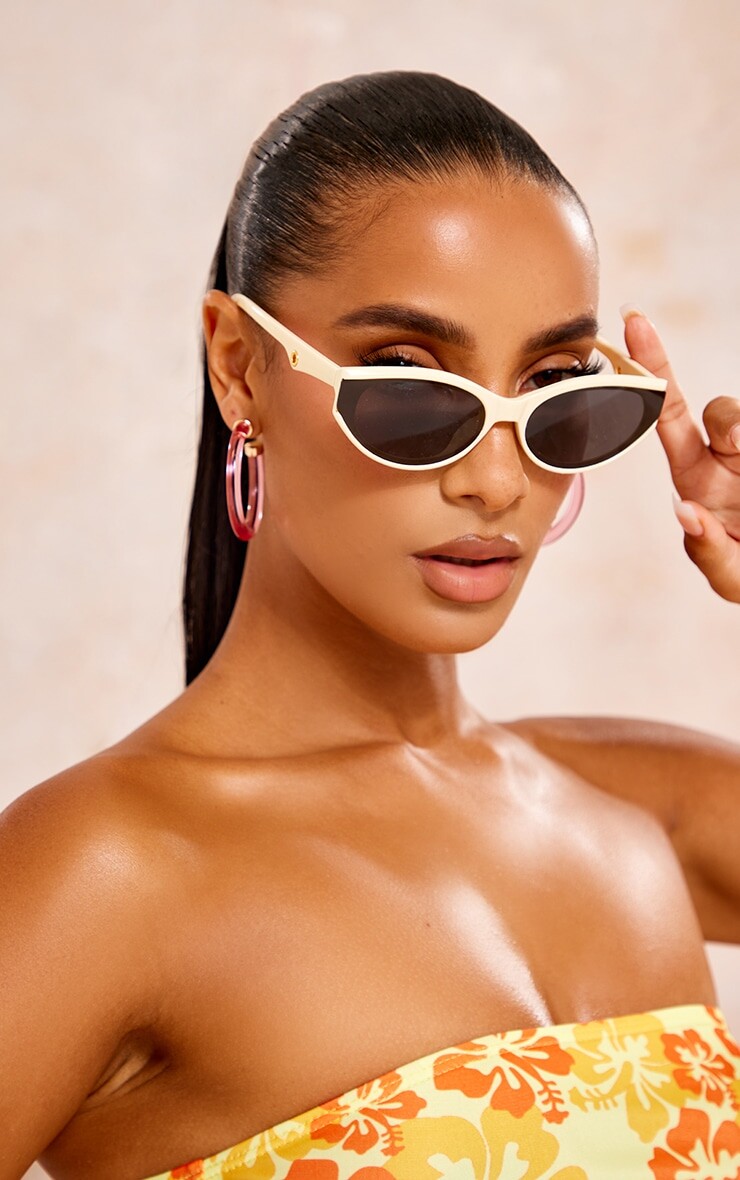 

PrettyLittleThing Кремовые закругленные спортивные солнцезащитные очки «кошачий глаз»