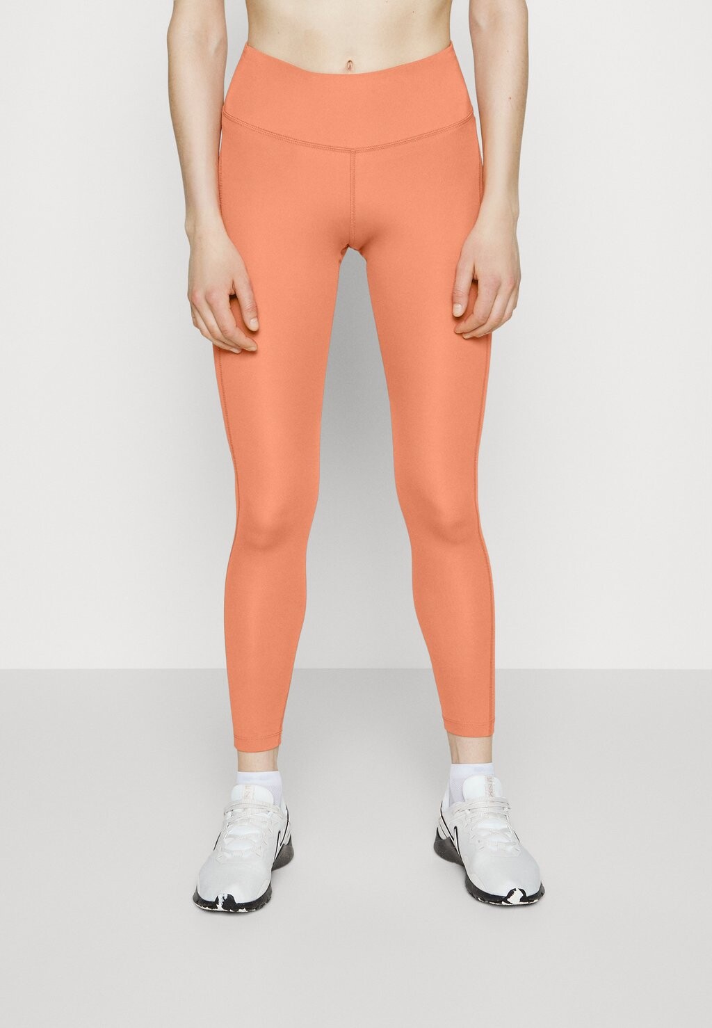 

Тайтсы Nike, Оранжевый