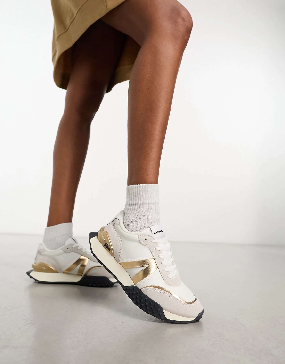 

Бело-золотые кроссовки Lacoste Spin Deluxe