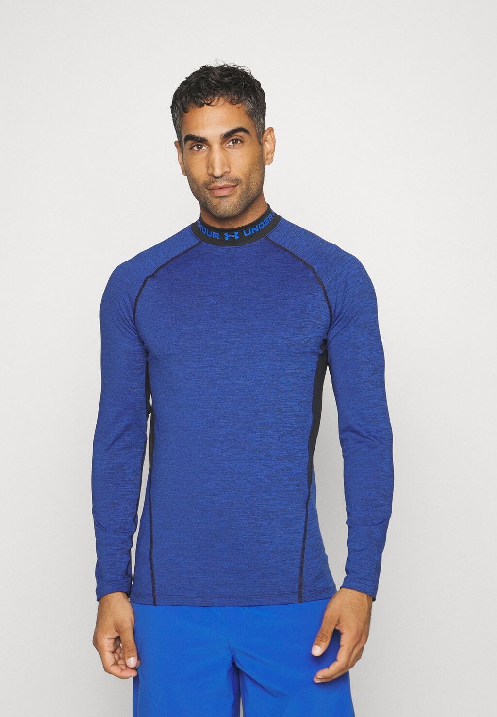 

Футболка с длинными рукавами TWIST MOCK Under Armour, team royal