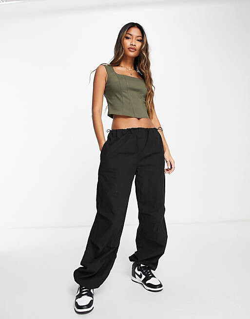 

Корсетный топ цвета хаки с закрытыми рукавами и швами ASOS DESIGN