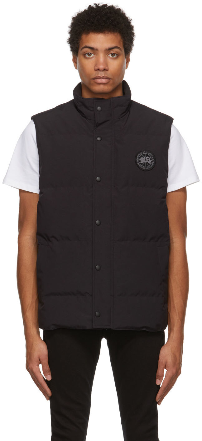 

Темно-синий пуховый жилет с гарсоном Canada Goose