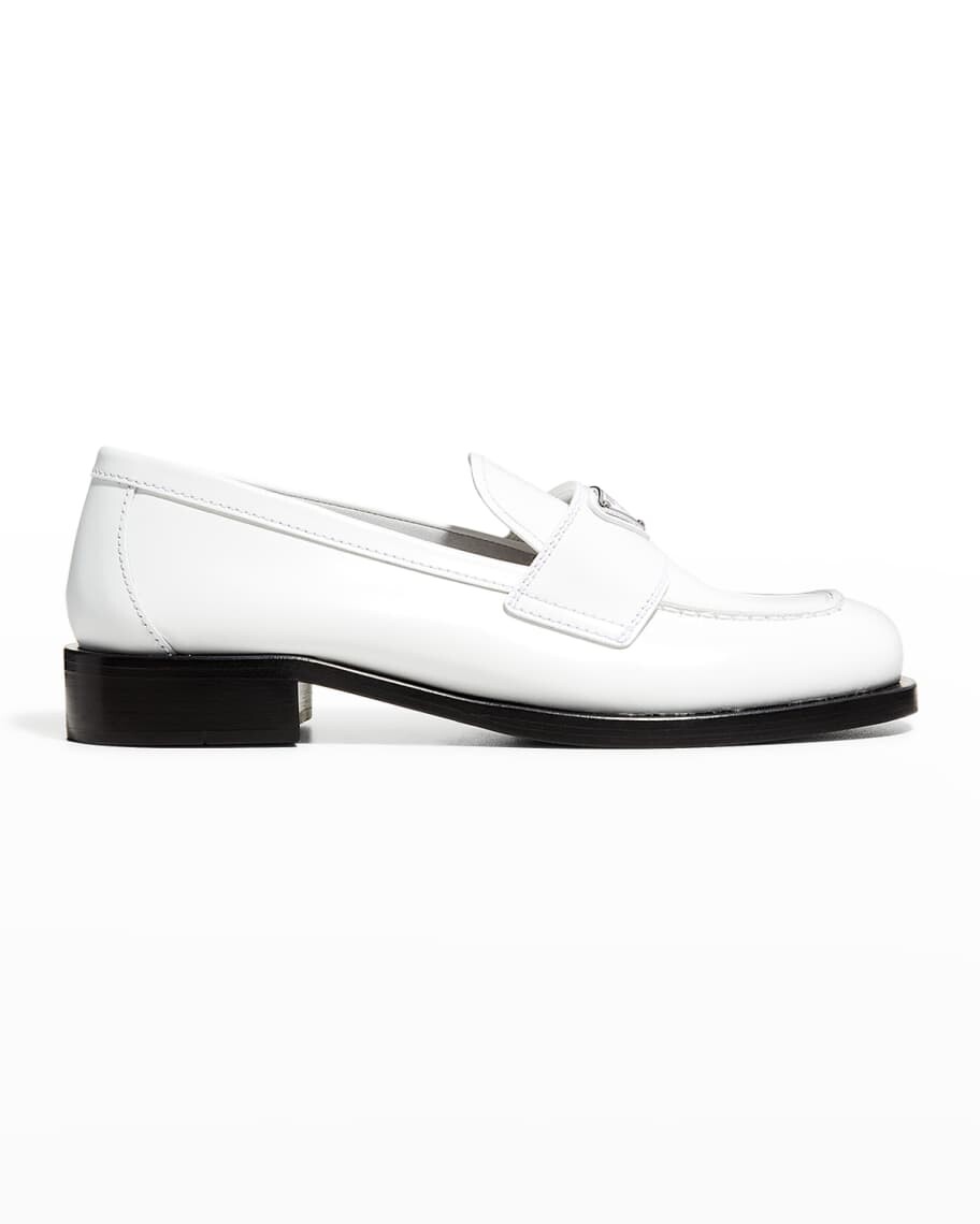 

Лоферы на плоской подошве с логотипом из телячьей кожи Prada