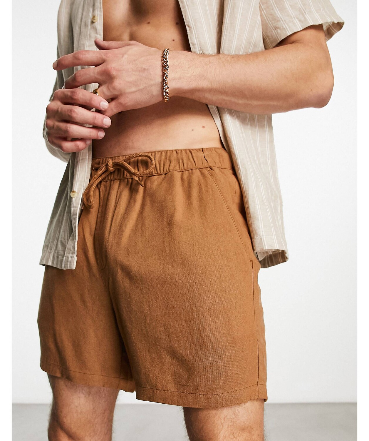 

Коричневые узкие льняные шорты укороченной длины ASOS DESIGN
