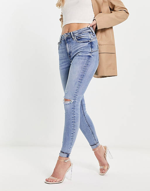 

Рваные джинсы скинни с завышенной талией River Island среднего синего цвета