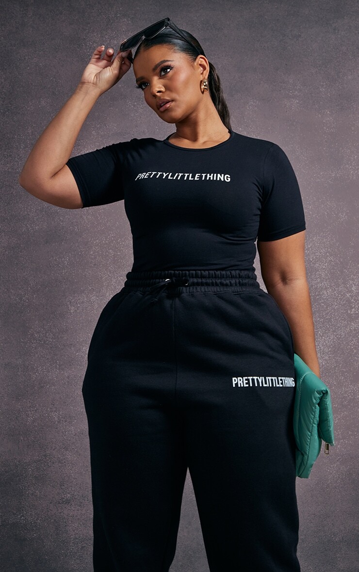 

PrettyLittleThing Плюс Черное боди с короткими рукавами