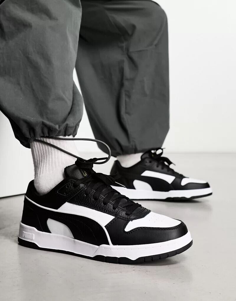 

Черно-белые кроссовки PUMA Rebound