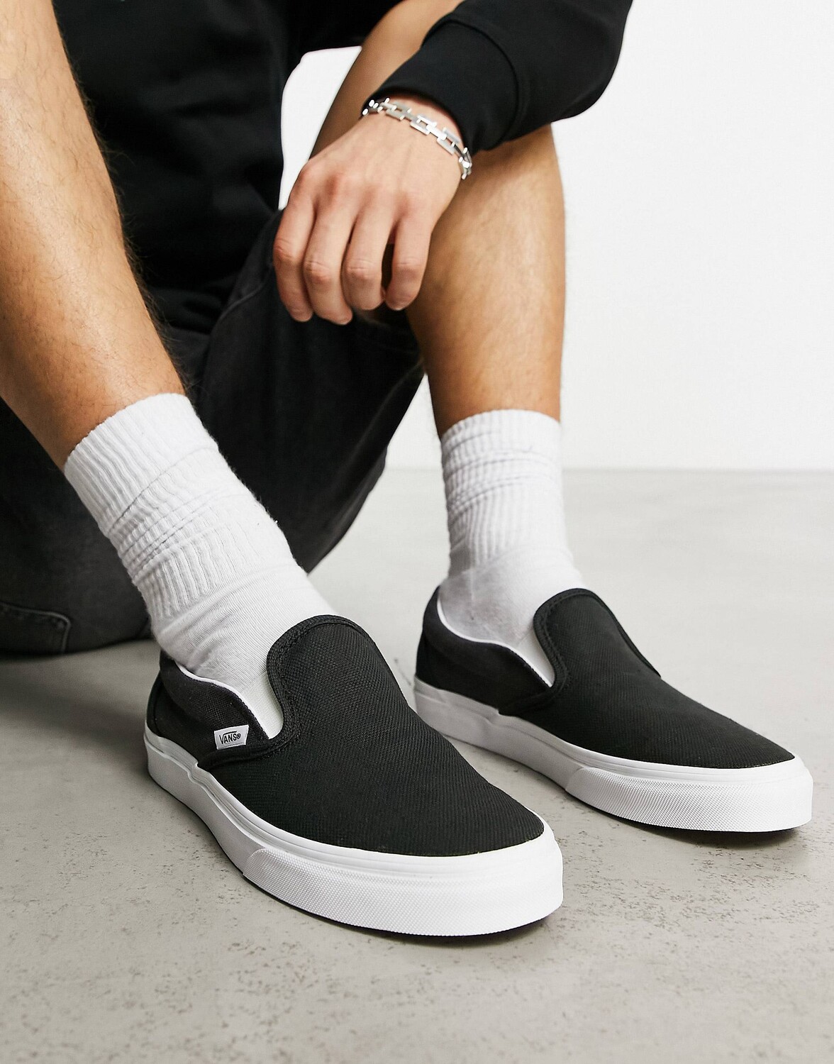 

Черные льняные кроссовки Vans Slip On