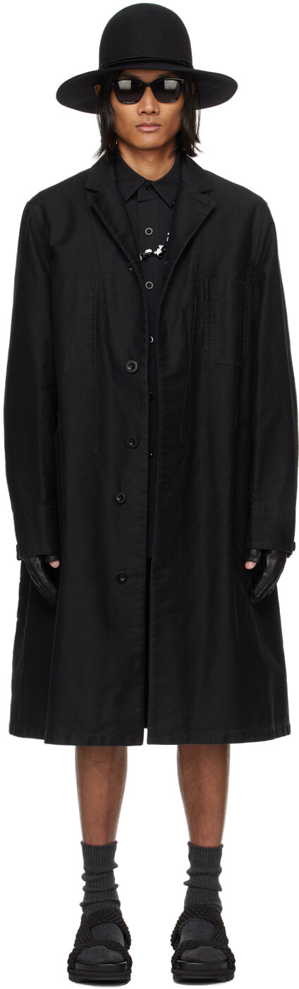 

Черное пальто из свободной нити Sacai