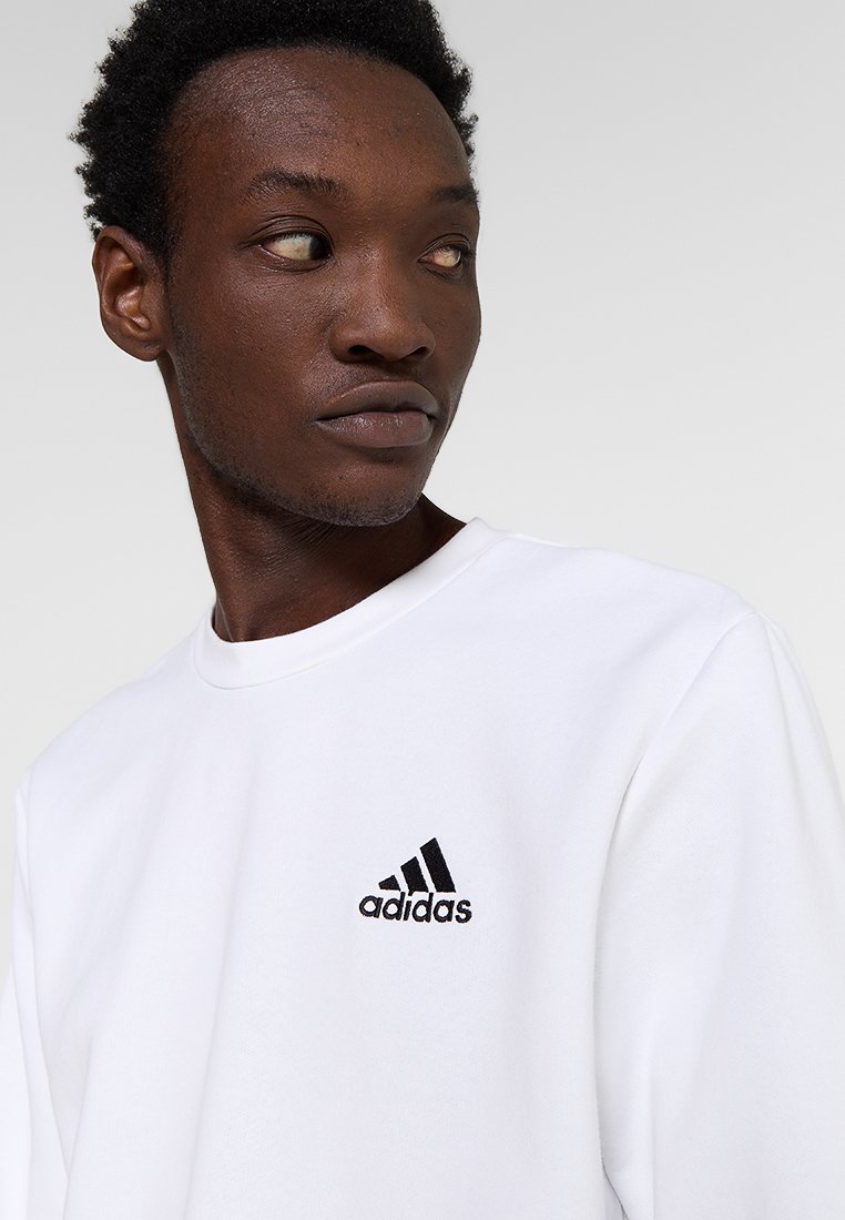 

Толстовка FEEL COZY ESSENTIALS FLEECE adidas Sportswear, белый