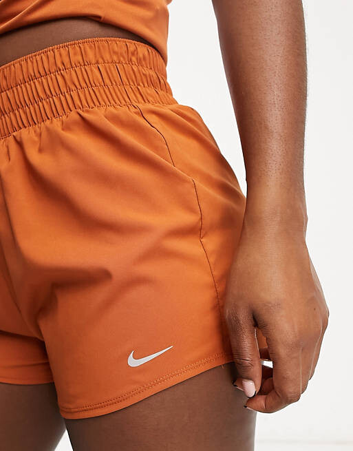 

Оранжевые шорты с высокой посадкой Nike Training One