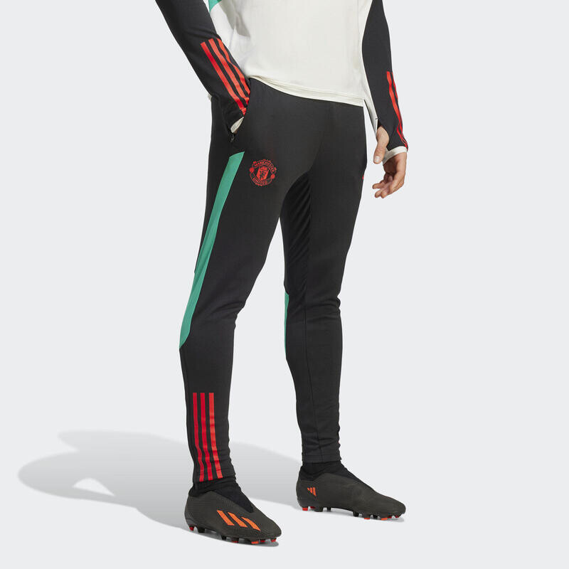 

Тренировочные брюки Manchester United Tiro 23 ADIDAS, цвет schwarz