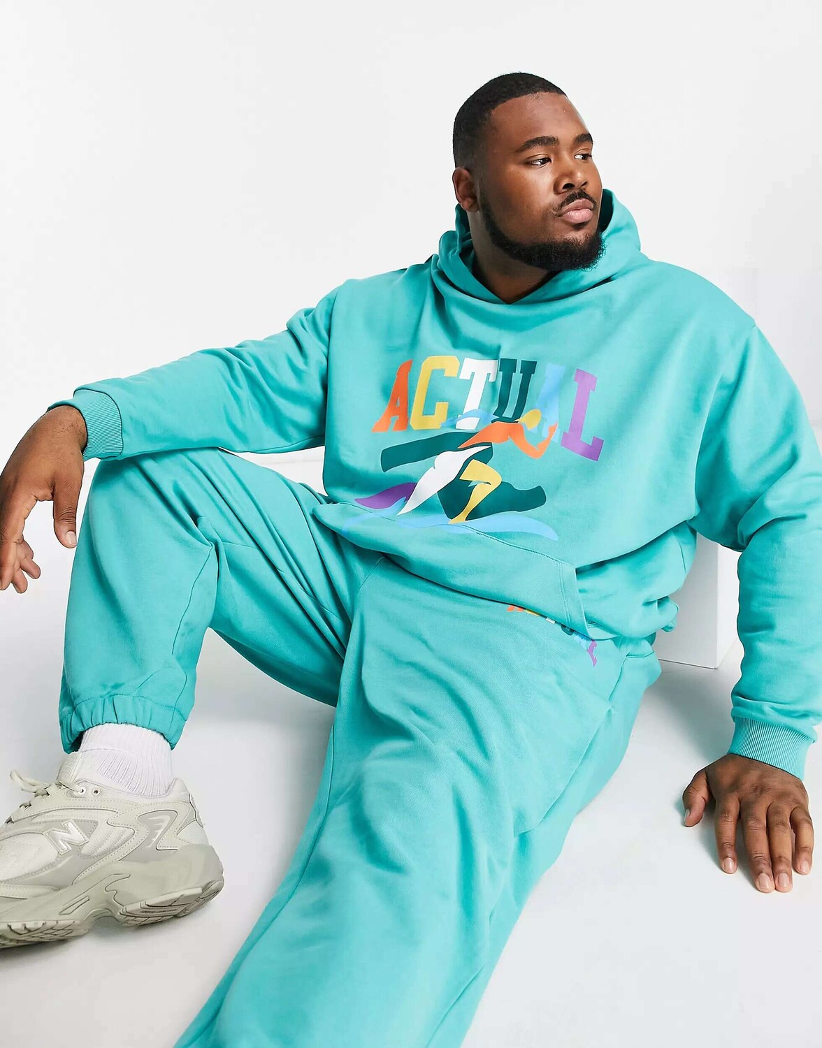 

Бирюзовая толстовка оверсайз с разноцветным рисунком ASOS Actual, Зеленый