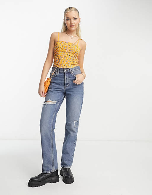 

Топ на бретелях с рюшами и рюшами ASOS DESIGN с оранжевым цветочным принтом