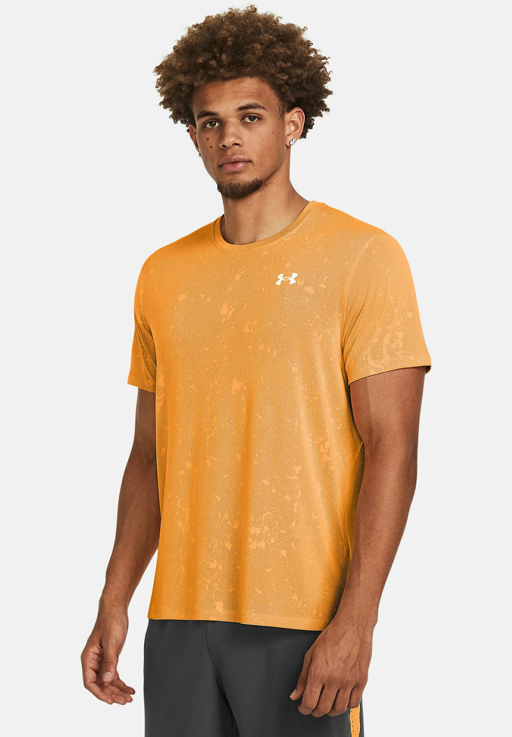 цена Спортивная футболка SHORT-SLEEVES LAUNCH SPLATTER Under Armour, цвет nova orange