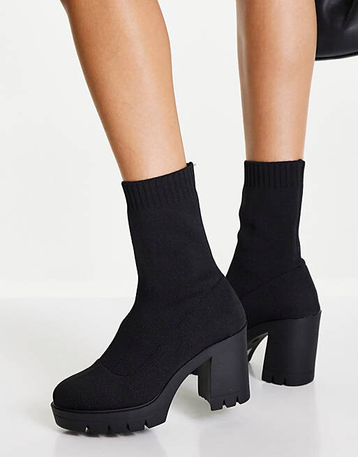 

Черные вязаные ботинки-носки на высоком каблуке ASOS DESIGN Earthly