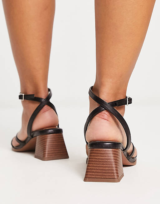 

Черные босоножки на среднем каблуке ASOS DESIGN Wide Fit Hastings