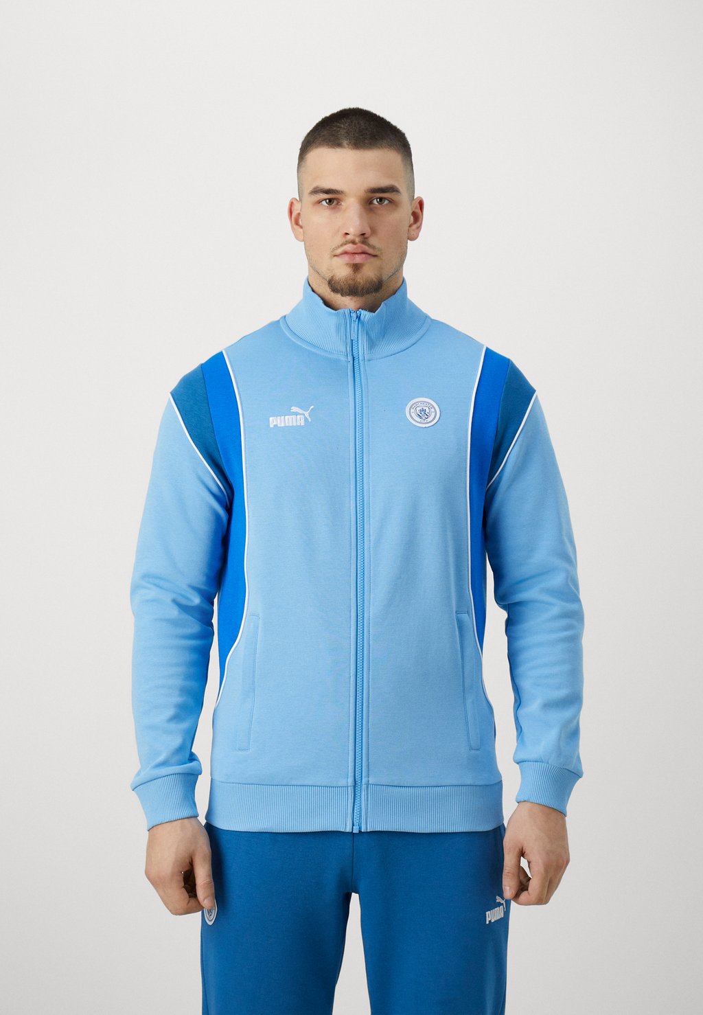 цена Куртка MANCHESTER CITY FTBLARCHIVE Puma, цвет team light blue/racing blue