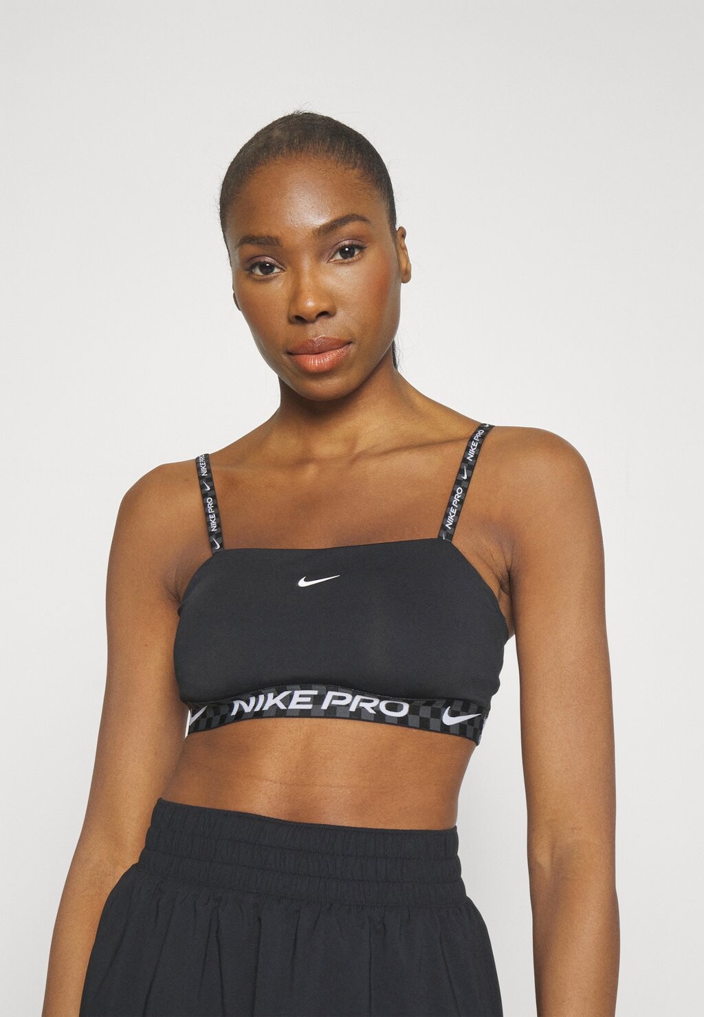 

Спортивный бюстгальтер с легкой поддержкой Nike