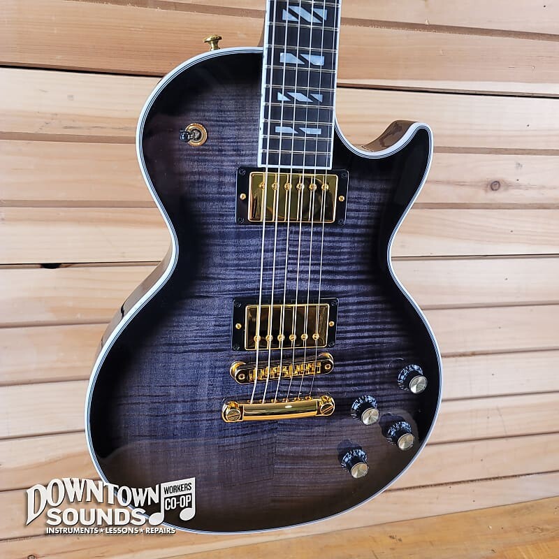 

Электрогитара Gibson Les Paul Supreme with Gibson Hard Case - Translucent Ebony Burst