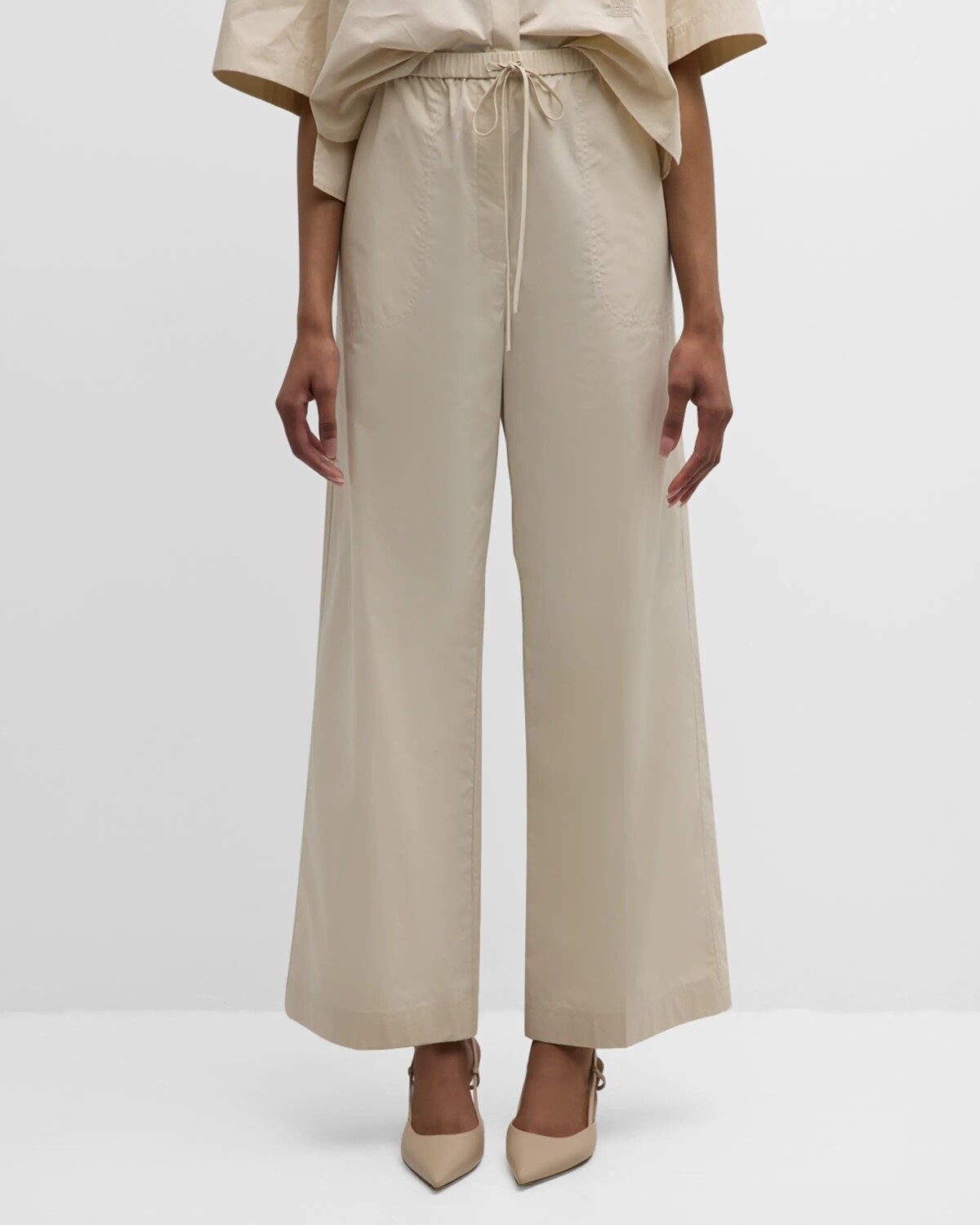 

Широкие хлопковые брюки с высокой посадкой и кулиской Toteme, цвет Light Beige